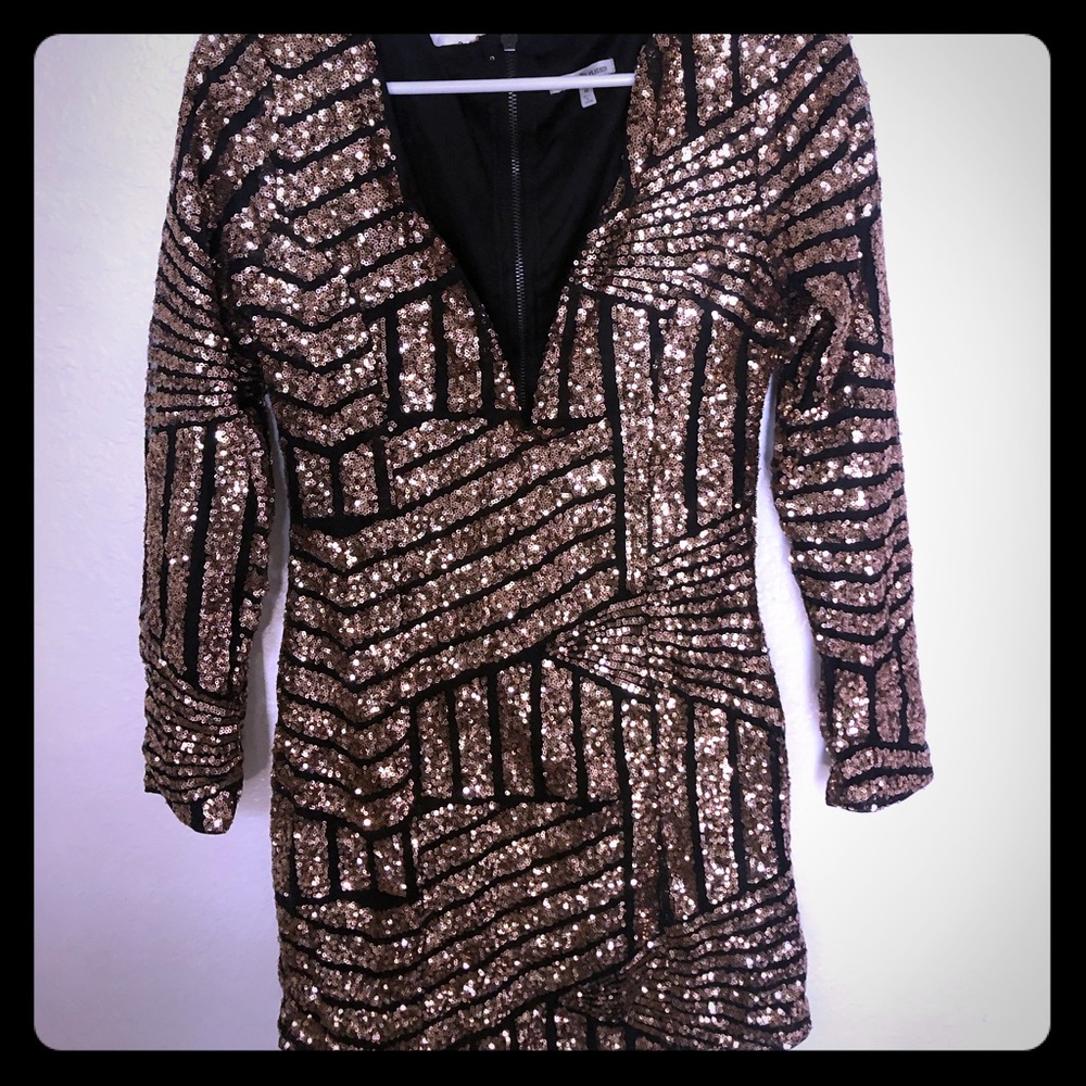 Black and gold sequenced dress